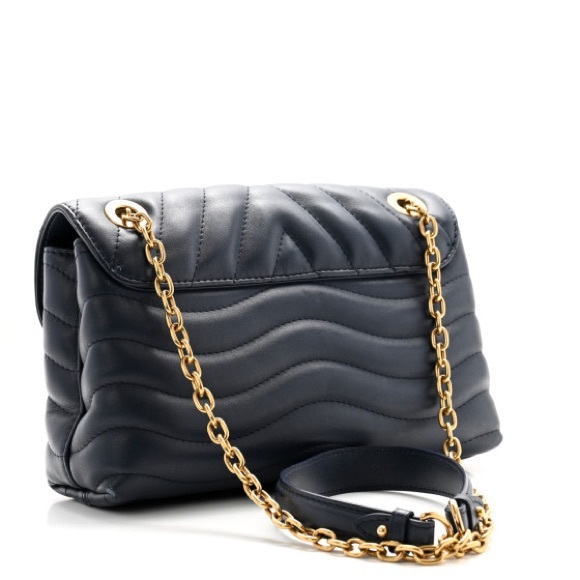 Louis Vuitton wave bag in excellent condition. - Picture 4 of 11